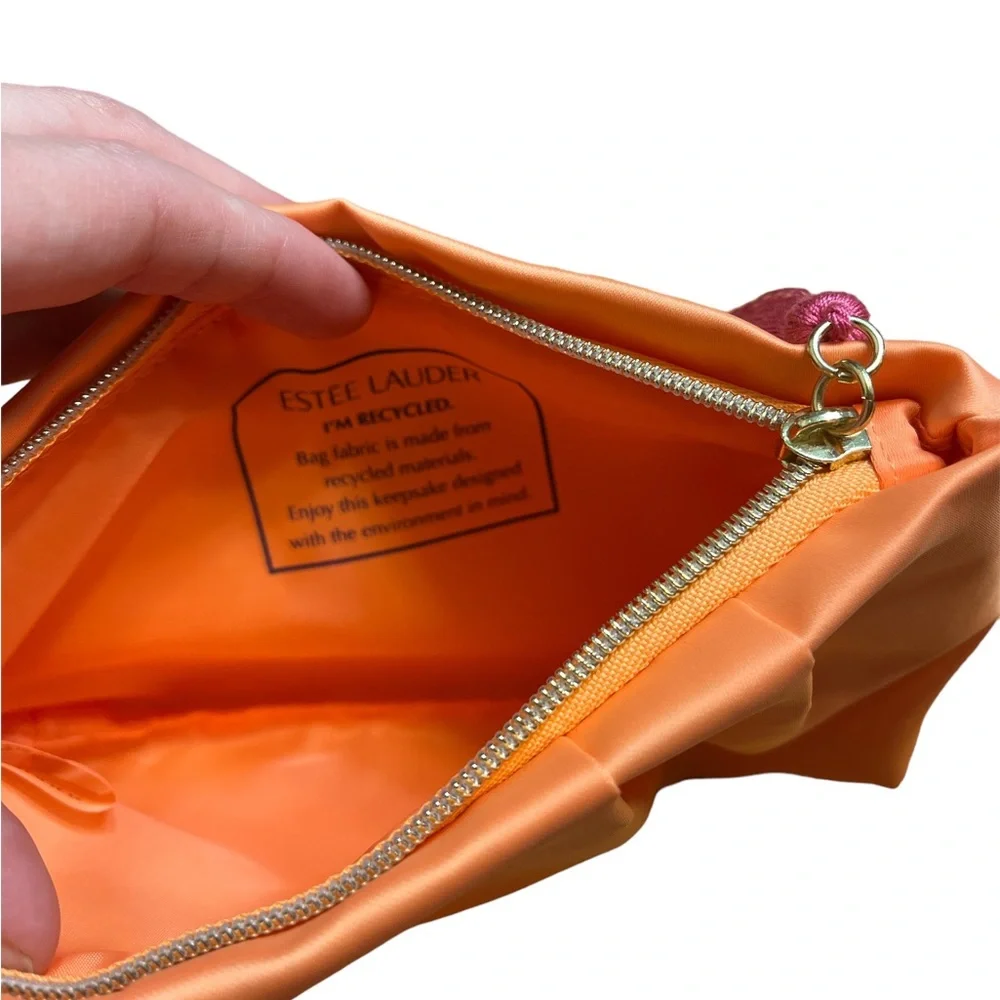 ✨ 3/$15 Estée Lauder Orange Tassel Makeup Bag